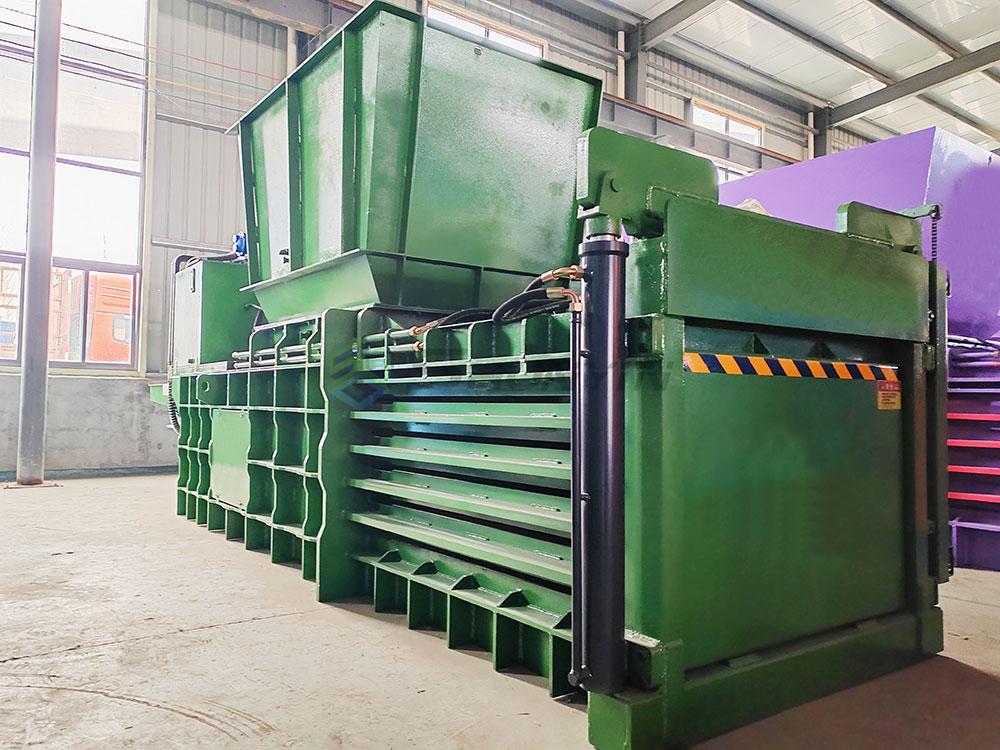 Designed for compressing waste paper, this horizontal baler offers high efficiency.